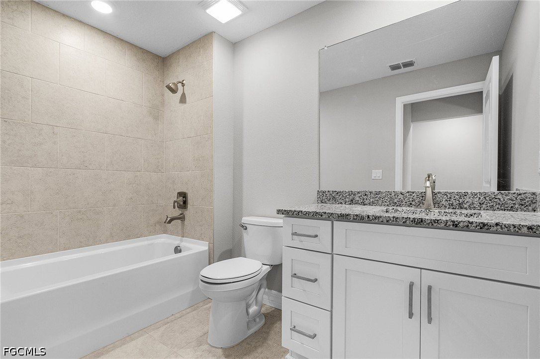 337 Woodburn Drive. Lehigh Acres, FL 33972