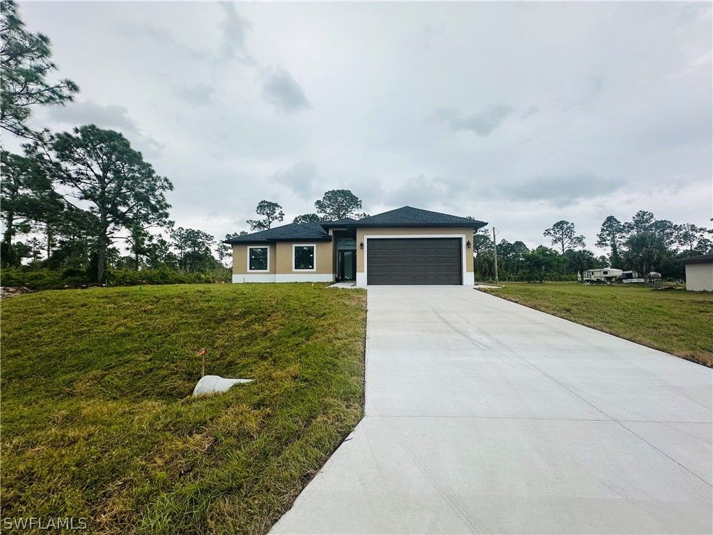 406 Irving Avenue. Lehigh Acres, FL 33972