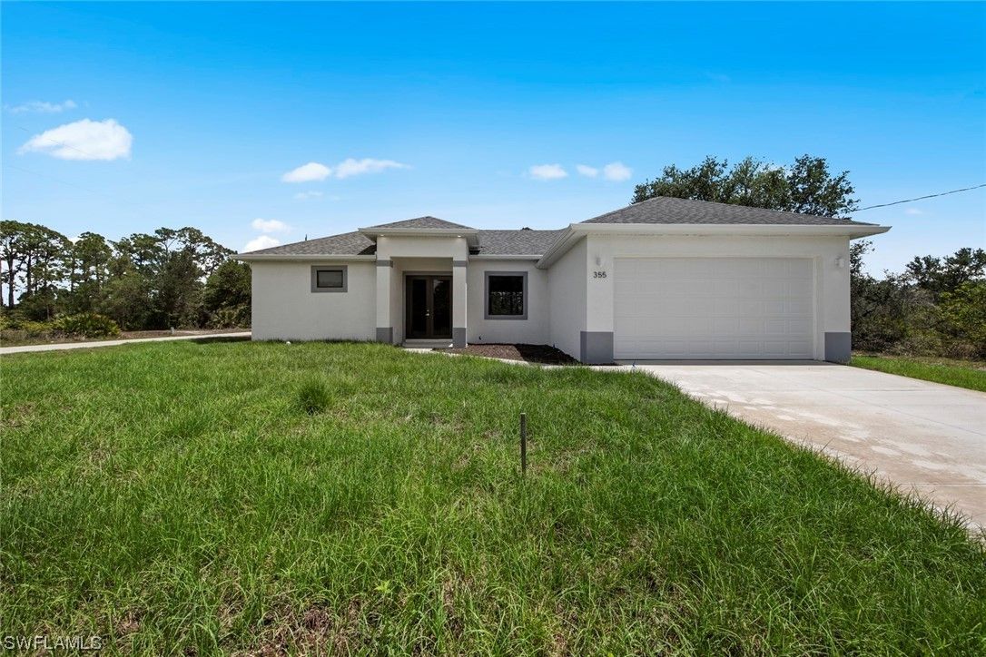 407 Ranier Avenue. Lehigh Acres, FL 33974