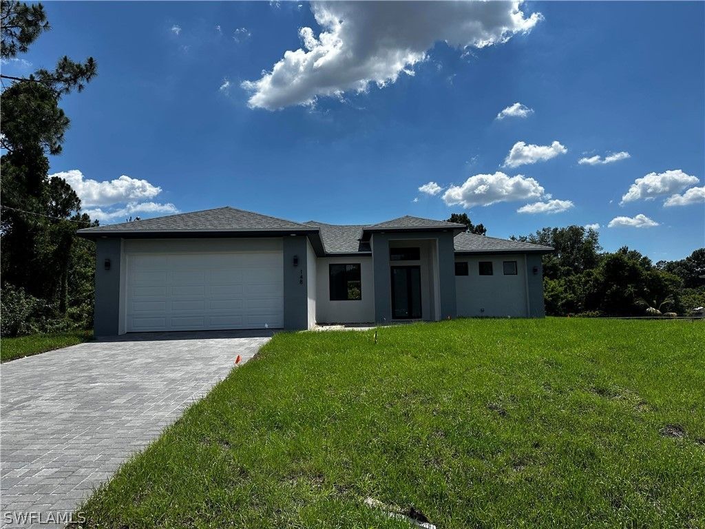 148 Wanatah Avenue. Lehigh Acres, FL 33974