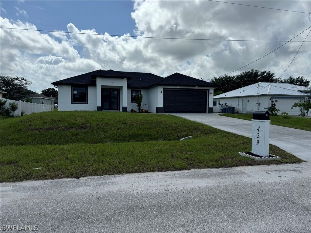 429 Picturesque. Lehigh Acres, FL 33974