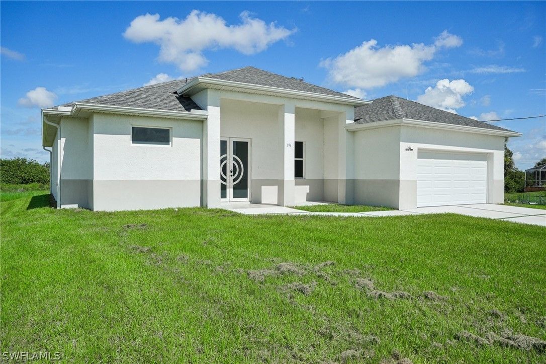 394 Palora Avenue. Lehigh Acres, FL 33974