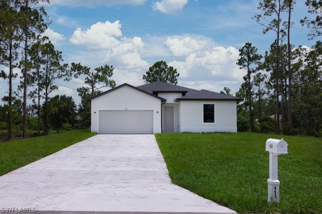 453 Woodman Drive. Lehigh Acres, FL 33972