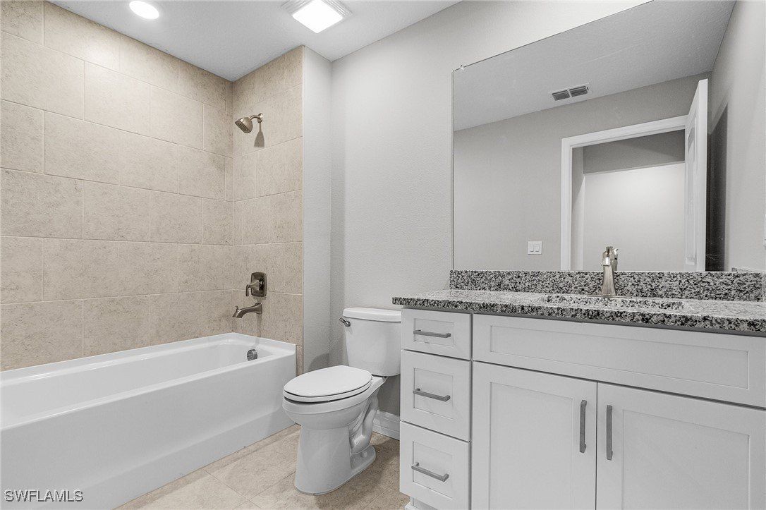 337 Woodburn Drive. Lehigh Acres, FL 33972