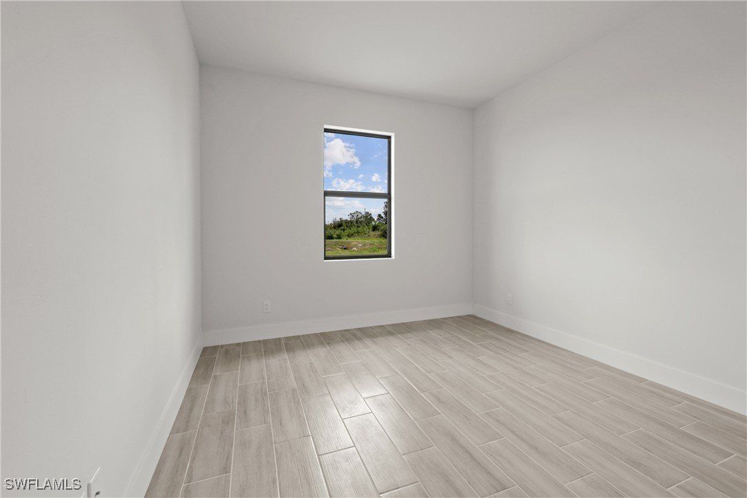 387 Paulcrest Avenue. Lehigh Acres, FL 33974