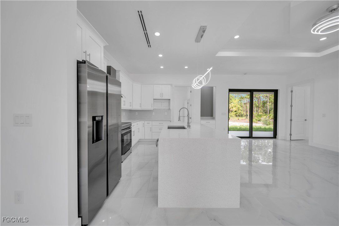 1689 Palmetto Avenue. Lehigh Acres, FL 33972