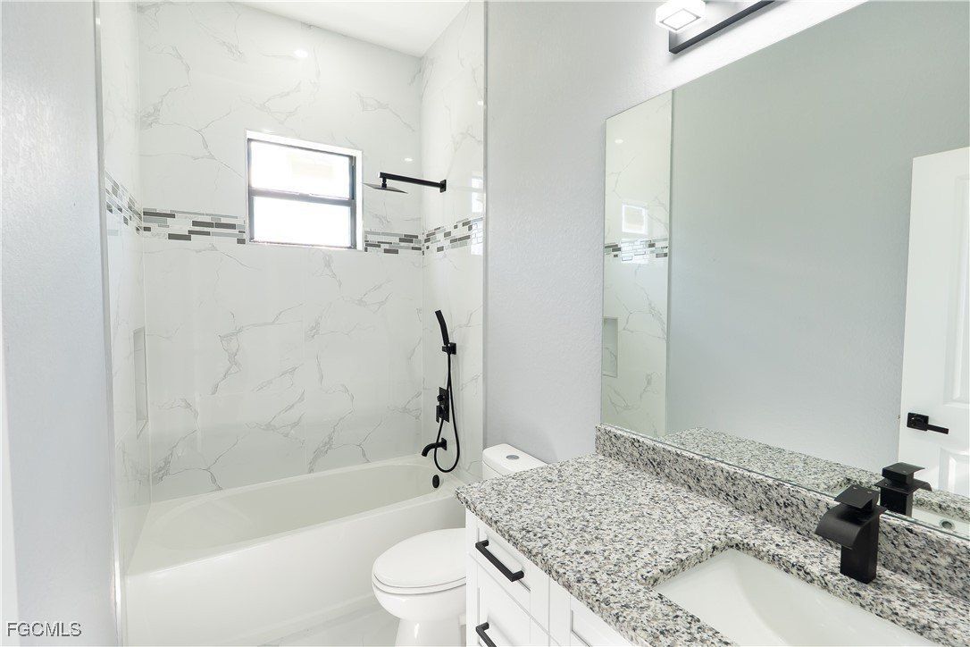 519 Lone Star Lane. Lehigh Acres, FL 33974