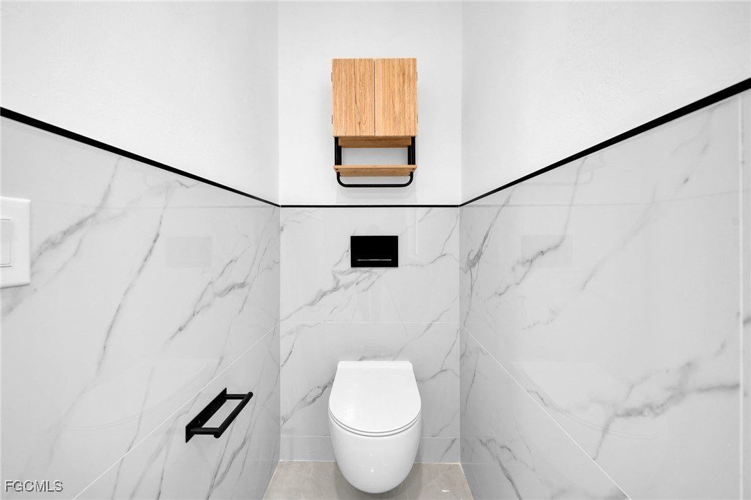 1719 Clayton Avenue. Lehigh Acres, FL 33972