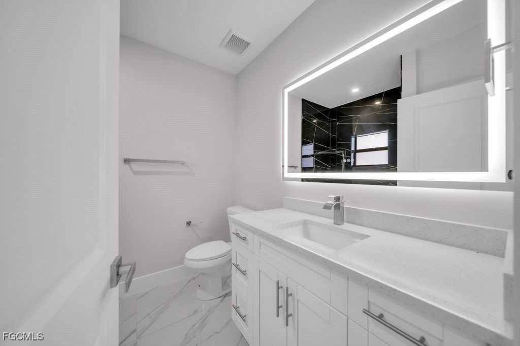 644 Woodcrest Drive. Lehigh Acres, FL 33972