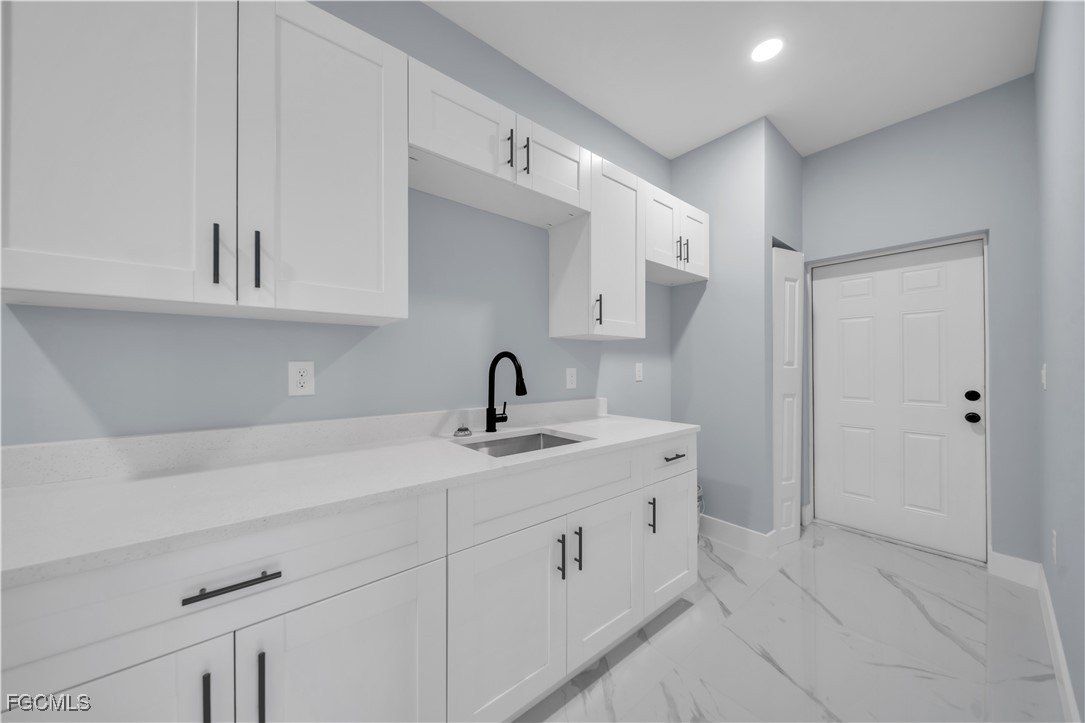 607 Hutton Street. Lehigh Acres, FL 33974