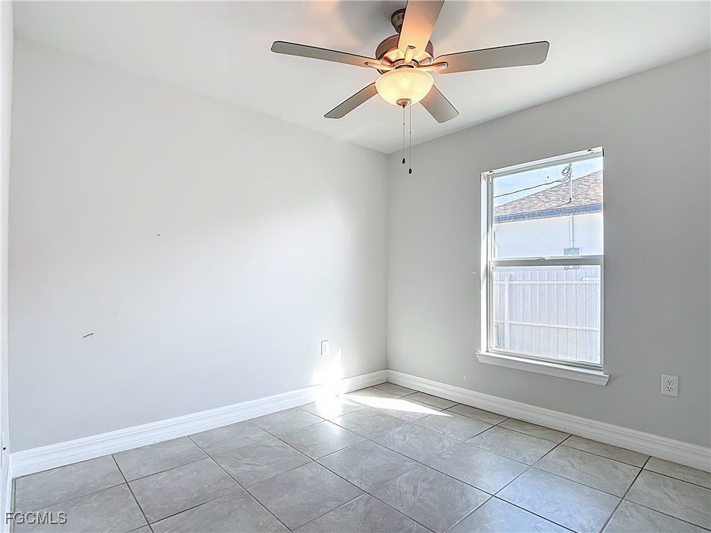 1021 Cedartree Avenue. Lehigh Acres, FL 33971