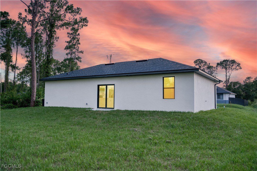 316 Mangonia Avenue. Lehigh Acres, FL 33974