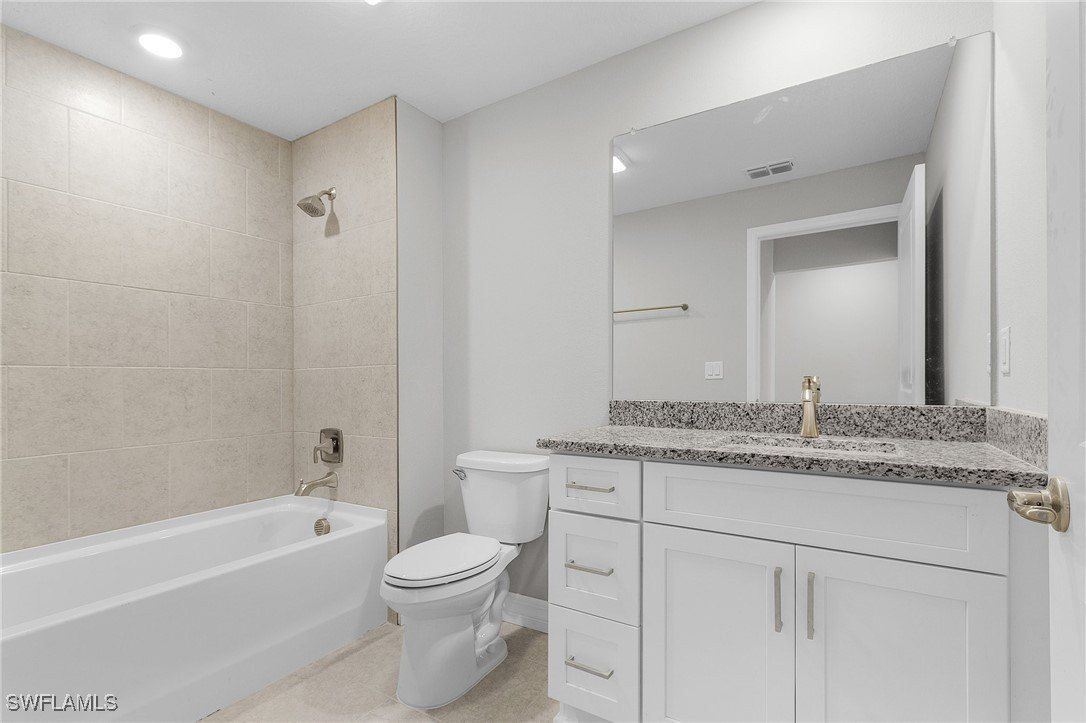 365 Woodburn Drive. Lehigh Acres, FL 33972