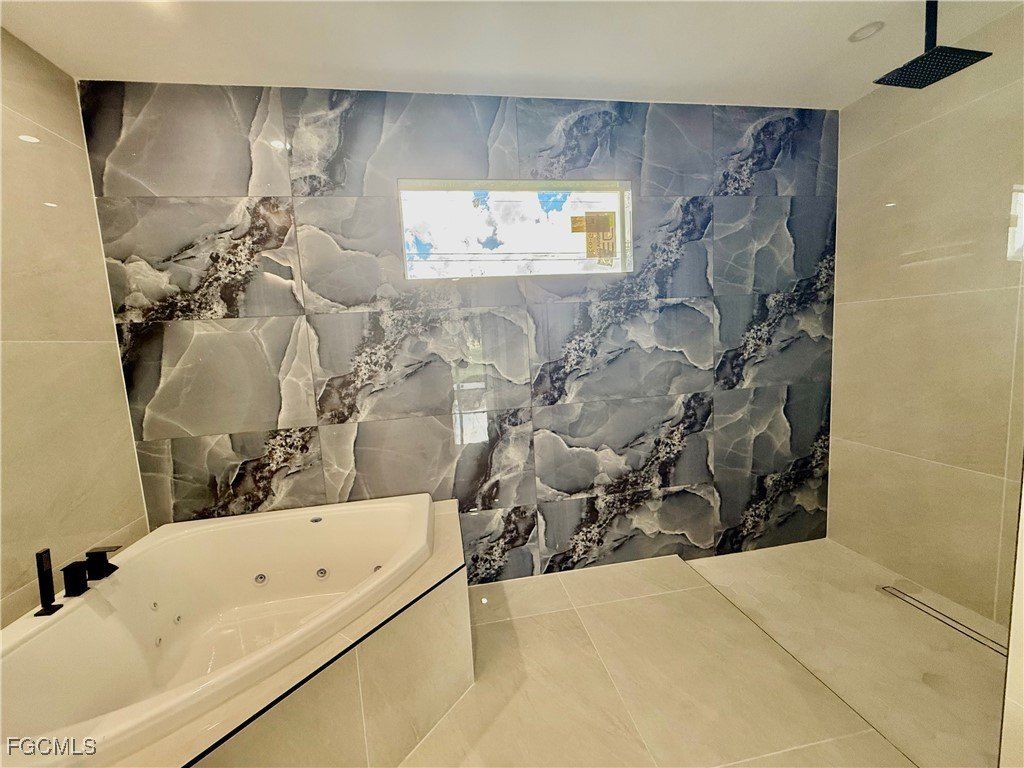 609 Mckinley Avenue. Lehigh Acres, FL 33972