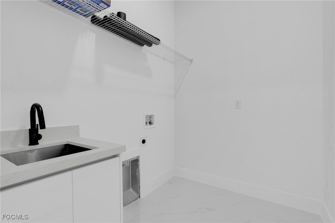 1040 Pine Cove Drive. Lehigh Acres, FL 33974