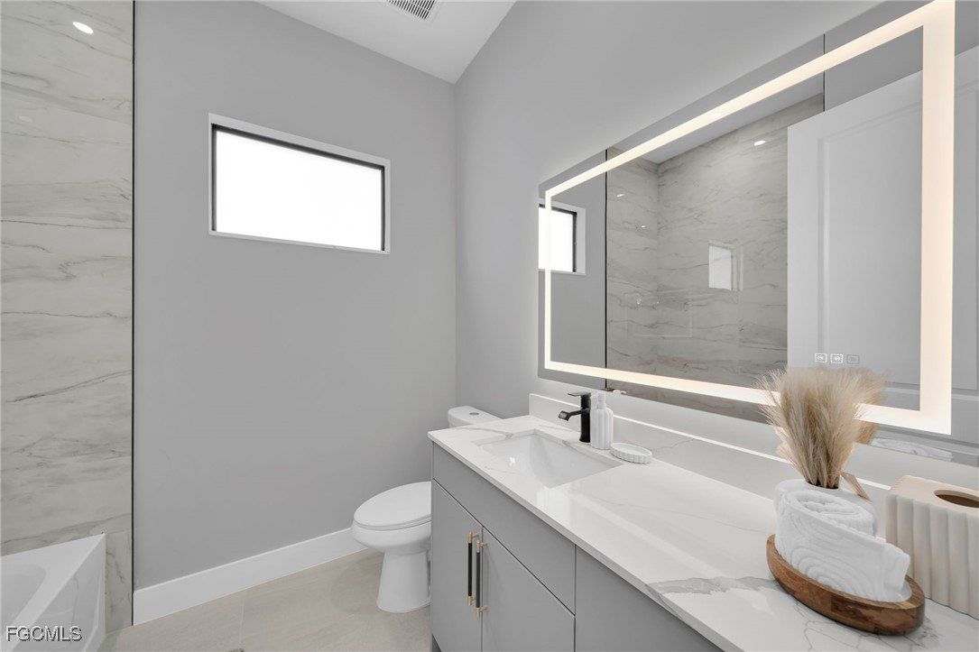 1002 Kanuga Street E. Lehigh Acres, FL 33974