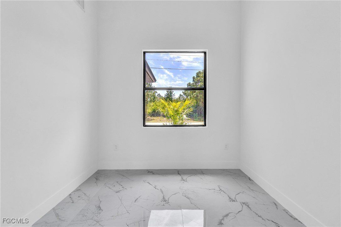 1025 Gladys Street. Lehigh Acres, FL 33974