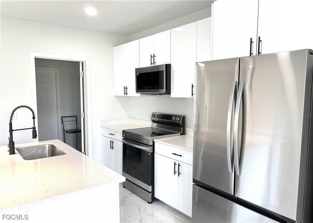 825 Porter Street E. Lehigh Acres, FL 33974