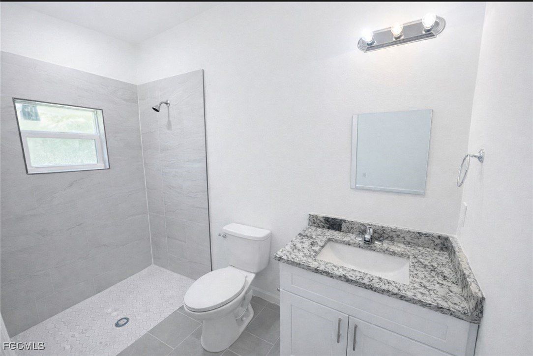 Th Street Sw. Lehigh Acres, FL 33976