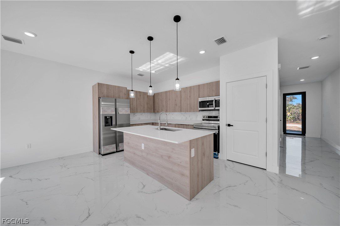 621 Greenbriar Boulevard. Lehigh Acres, FL 33972