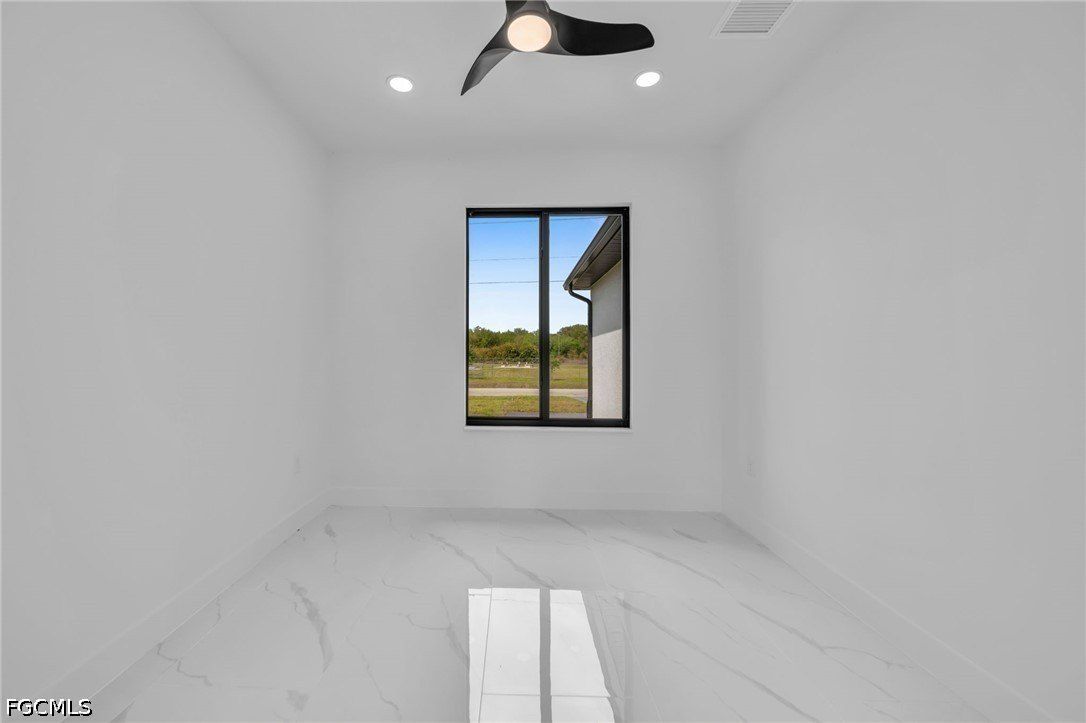 1618 Moore Avenue. Lehigh Acres, FL 33972