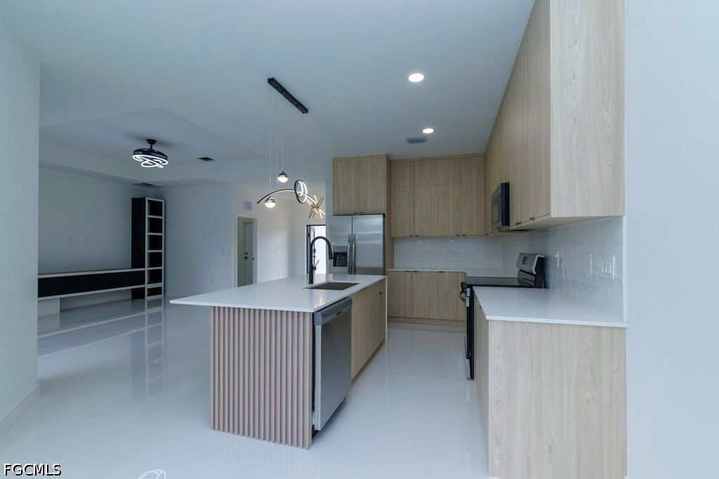 402 Thompson Avenue. Lehigh Acres, FL 33972