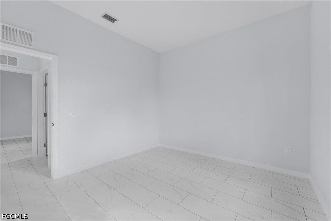 Genoa Avenue S. Lehigh Acres, FL 33974