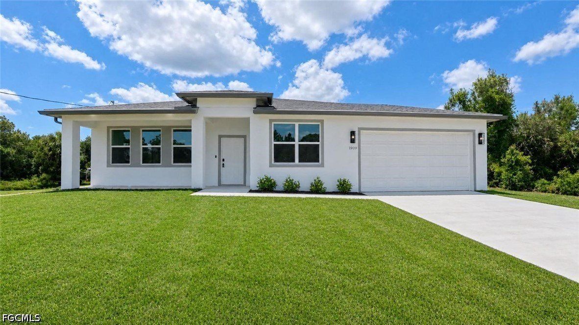 1909 Moore Avenue. Lehigh Acres, FL 33972
