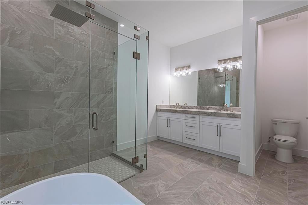 3098 Pine Tree Dr. Naples, FL 34112