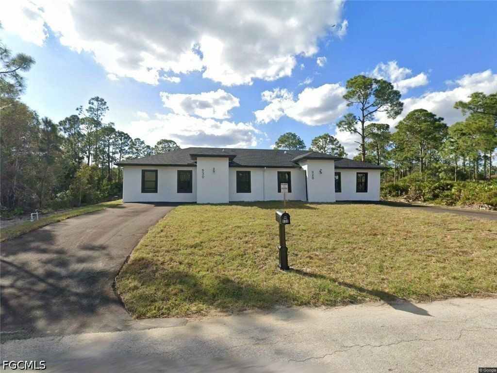 928930 Hepburn Avenue. Lehigh Acres, FL 33974