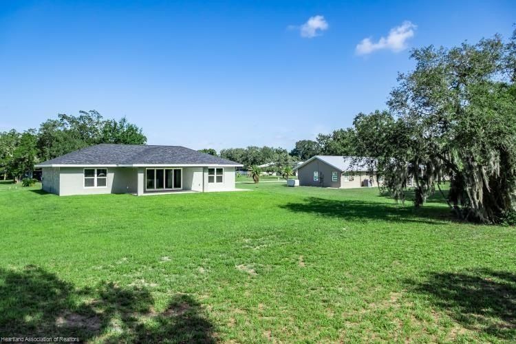 7609 Honeysuckle Drive. Sebring, FL 33876
