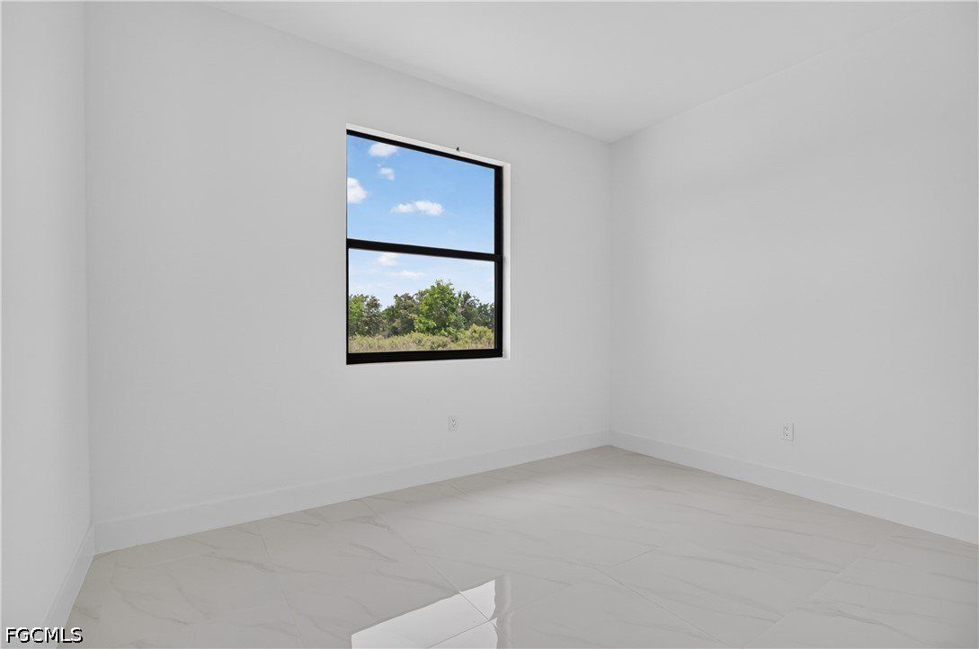 911 Panda Drive. Lehigh Acres, FL 33974