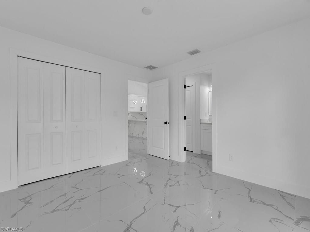 51255127 27Th St Sw. Lehigh Acres, FL 33973