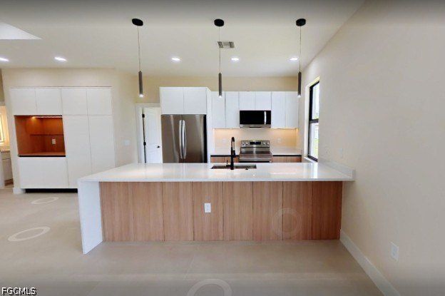 810 Carlfield Avenue. Lehigh Acres, FL 33971