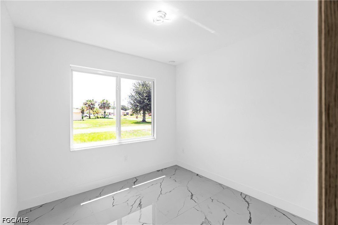 718 Robert Avenue. Lehigh Acres, FL 33936