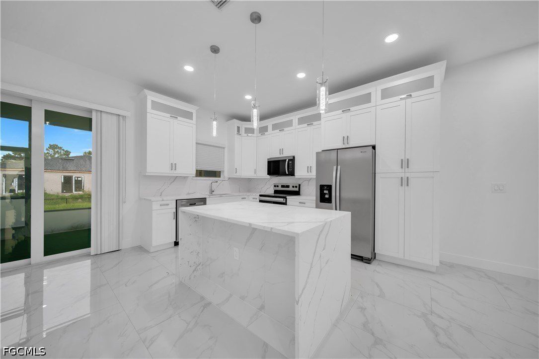 11531155 Countess Avenue. Lehigh Acres, FL 33974