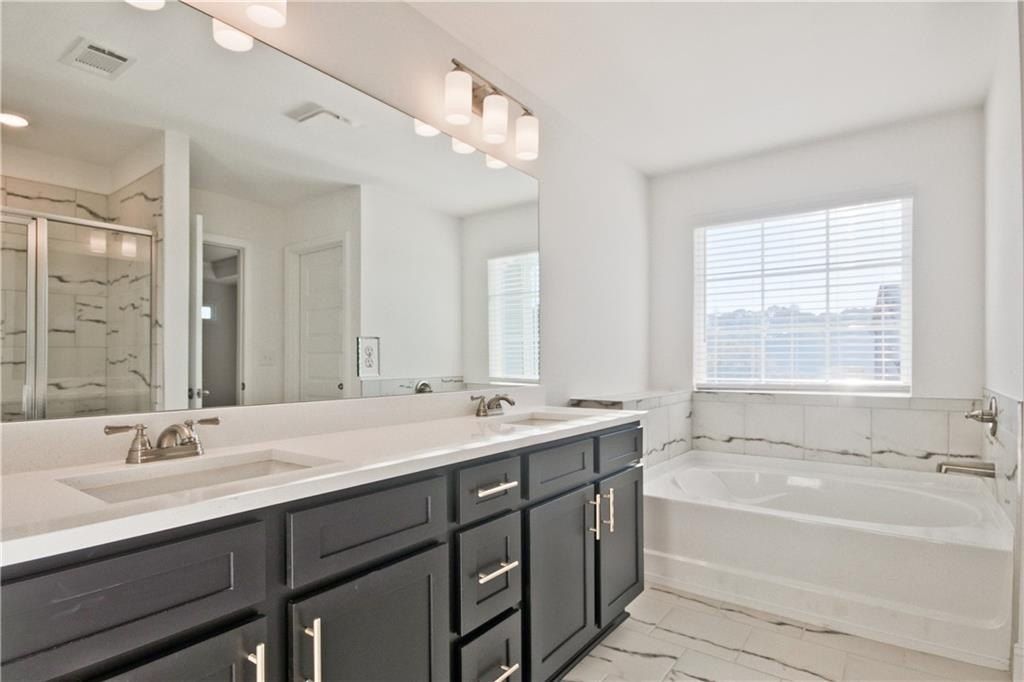 212 Open Waters Walk. Braselton, GA 30517