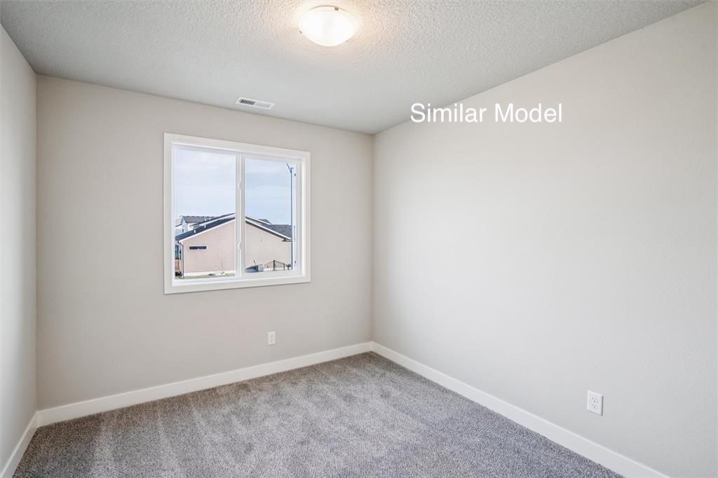 570 Nw Rockwood Lane. Grimes, IA 50111