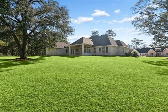 119 Chinawood Drive. Abita Springs, LA 70420