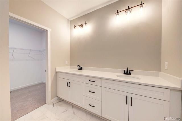 Moh 95 Gambrel Drive. Howell, MI 48843