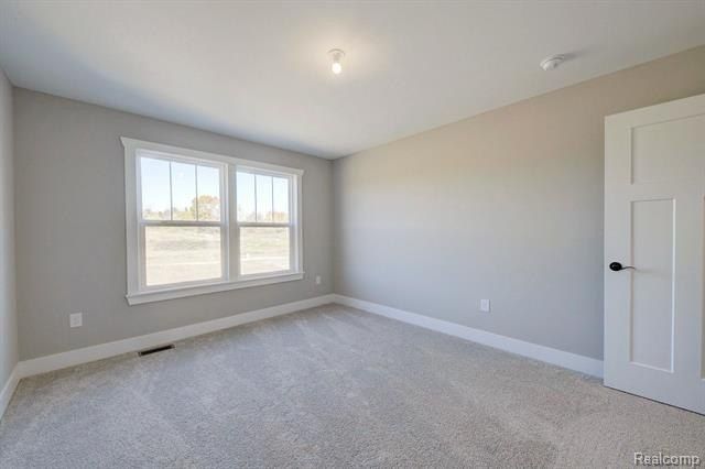 614 Round Rock Drive. Howell, MI 48843
