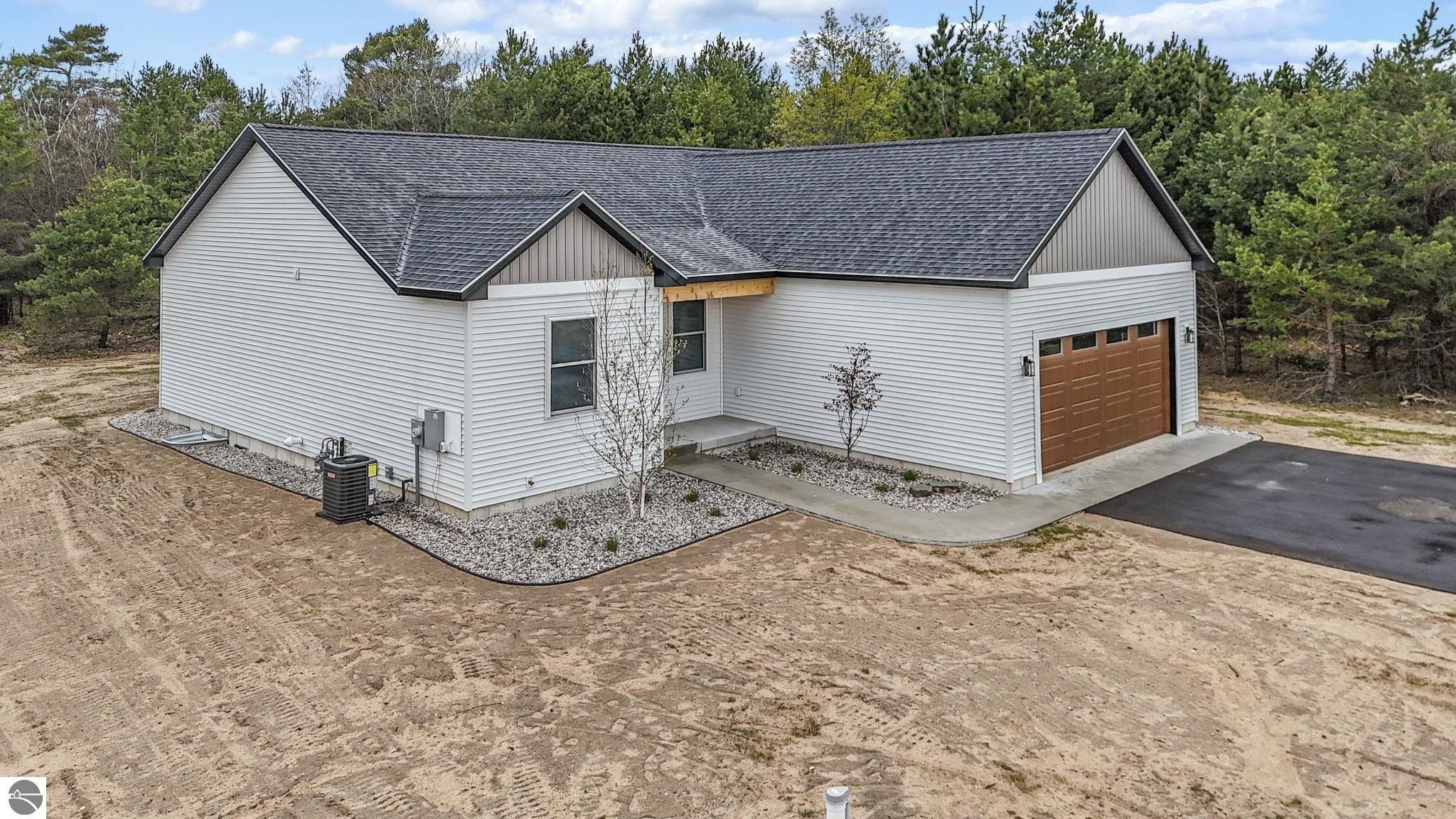 3038 Michele Marie. Grawn, MI 49637