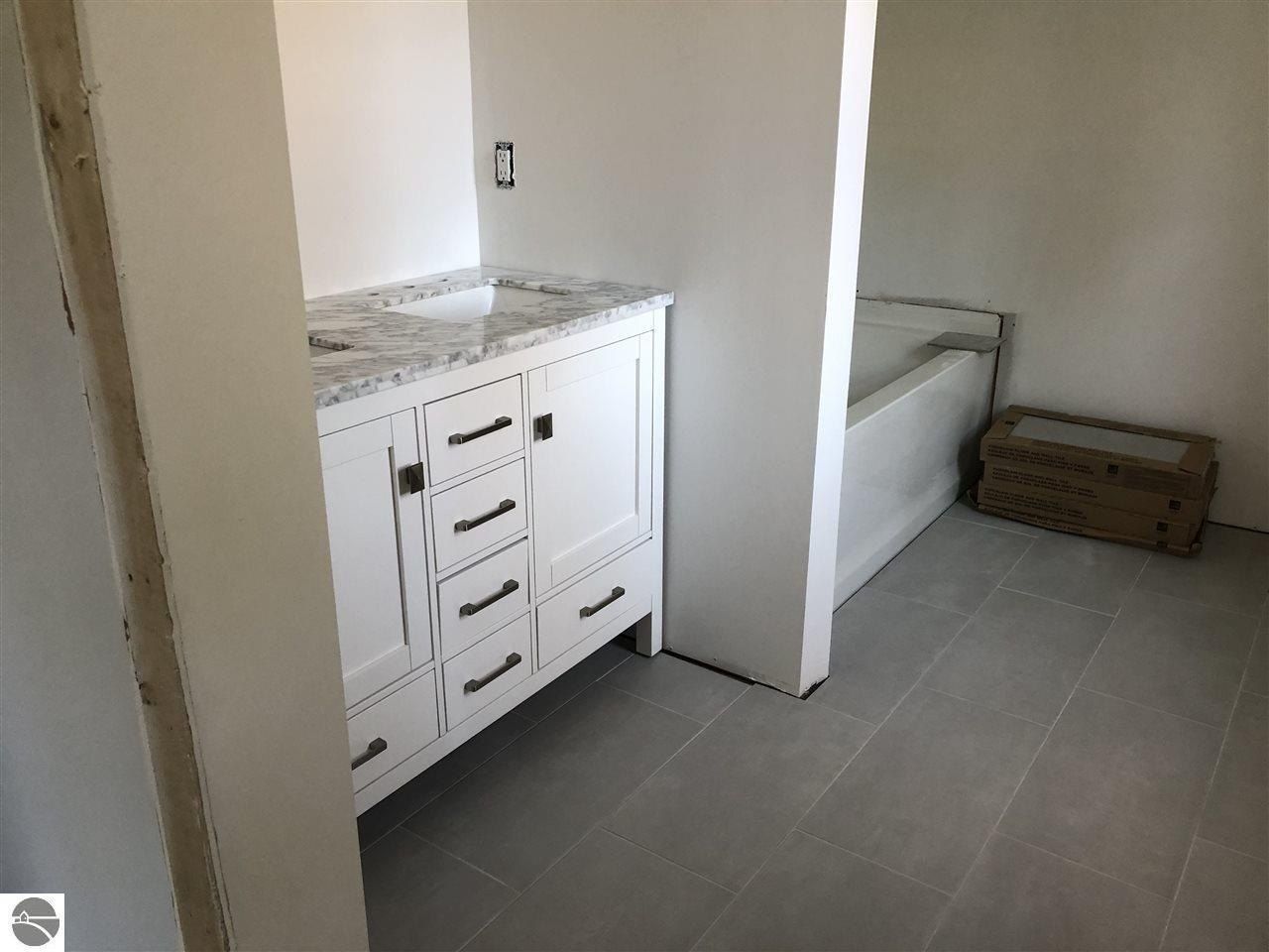 6504 Deepwater Point Road. Williamsburg, MI 49690