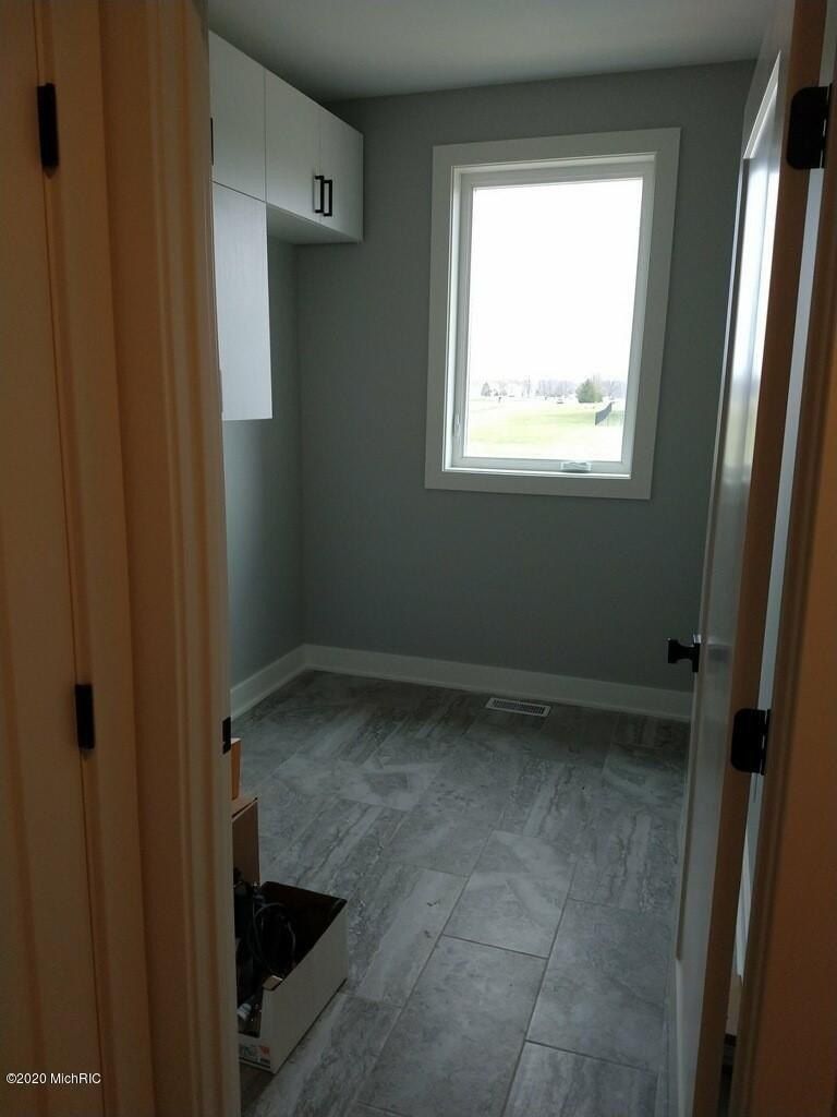 9505 Andrew Farm Court. Alto, MI 49302