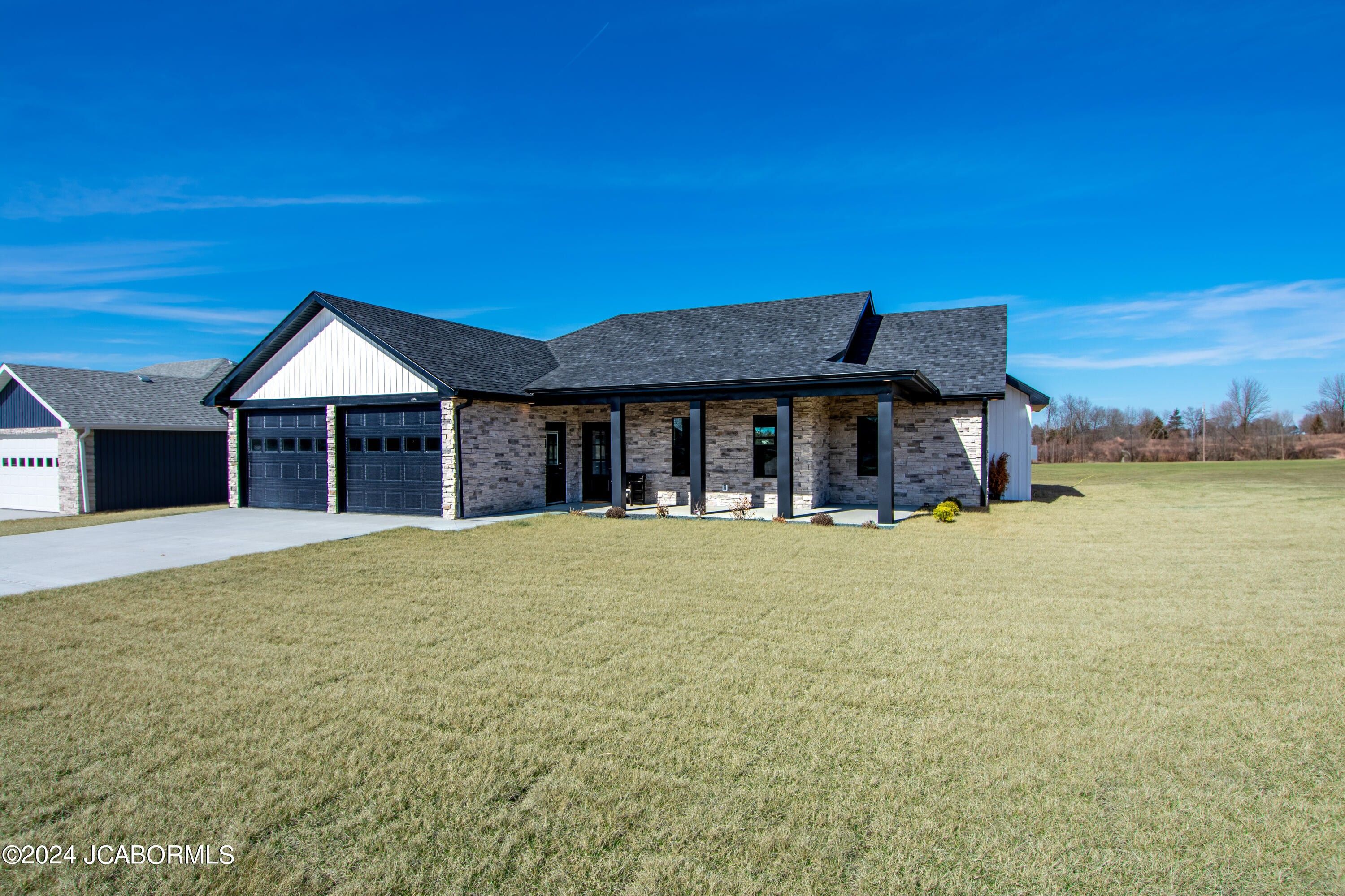 102 County Road 371. Holts Summit, MO 65043