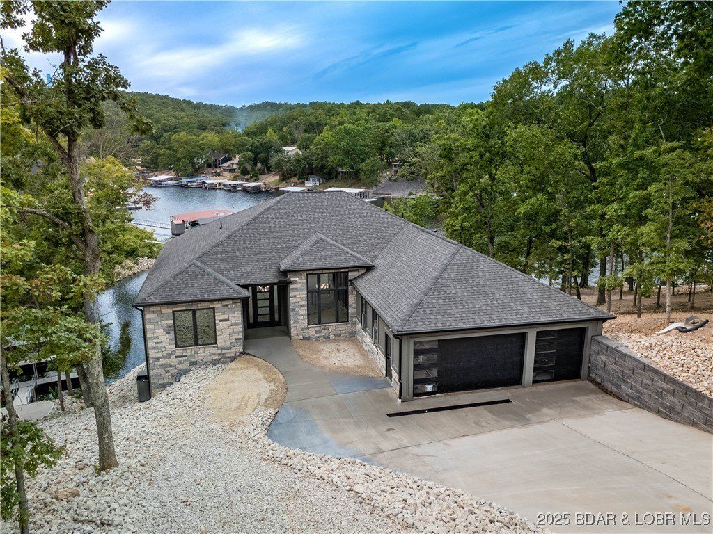 205 Beachnut Drive. Sunrise Beach, MO 65079