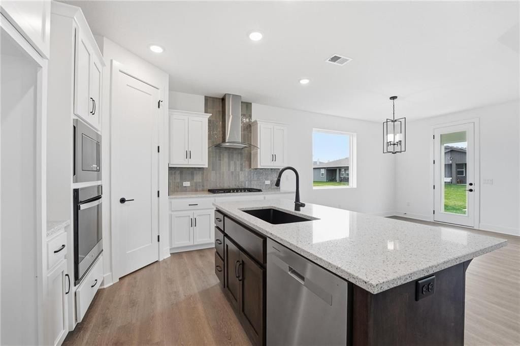 1820 Woodward Circle. Raymore, MO 64083