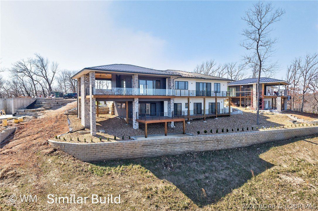 166 Big Bear Drive. Lake Ozark, MO 65049