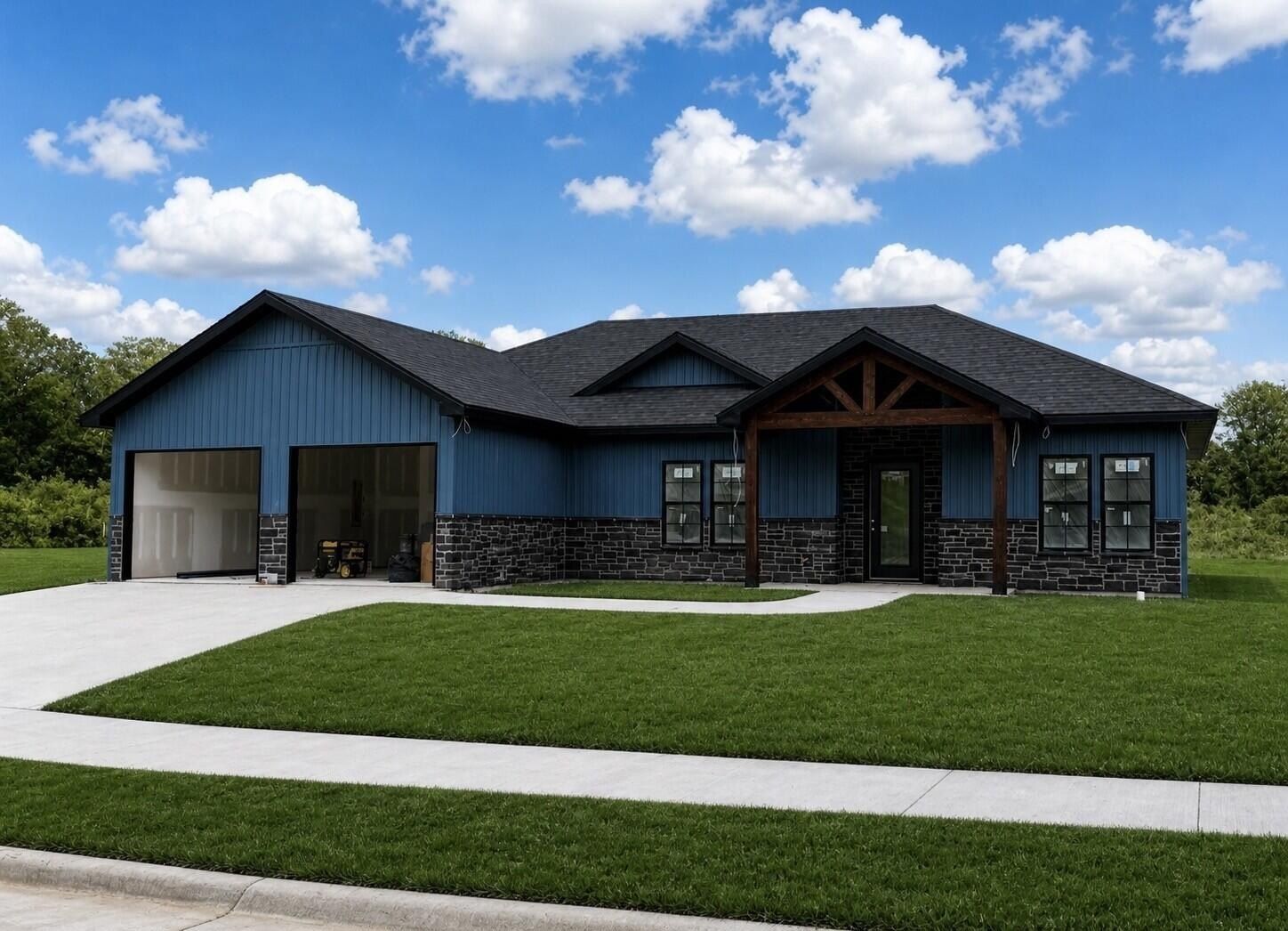 787 Vine Drive. Holts Summit, MO 65043