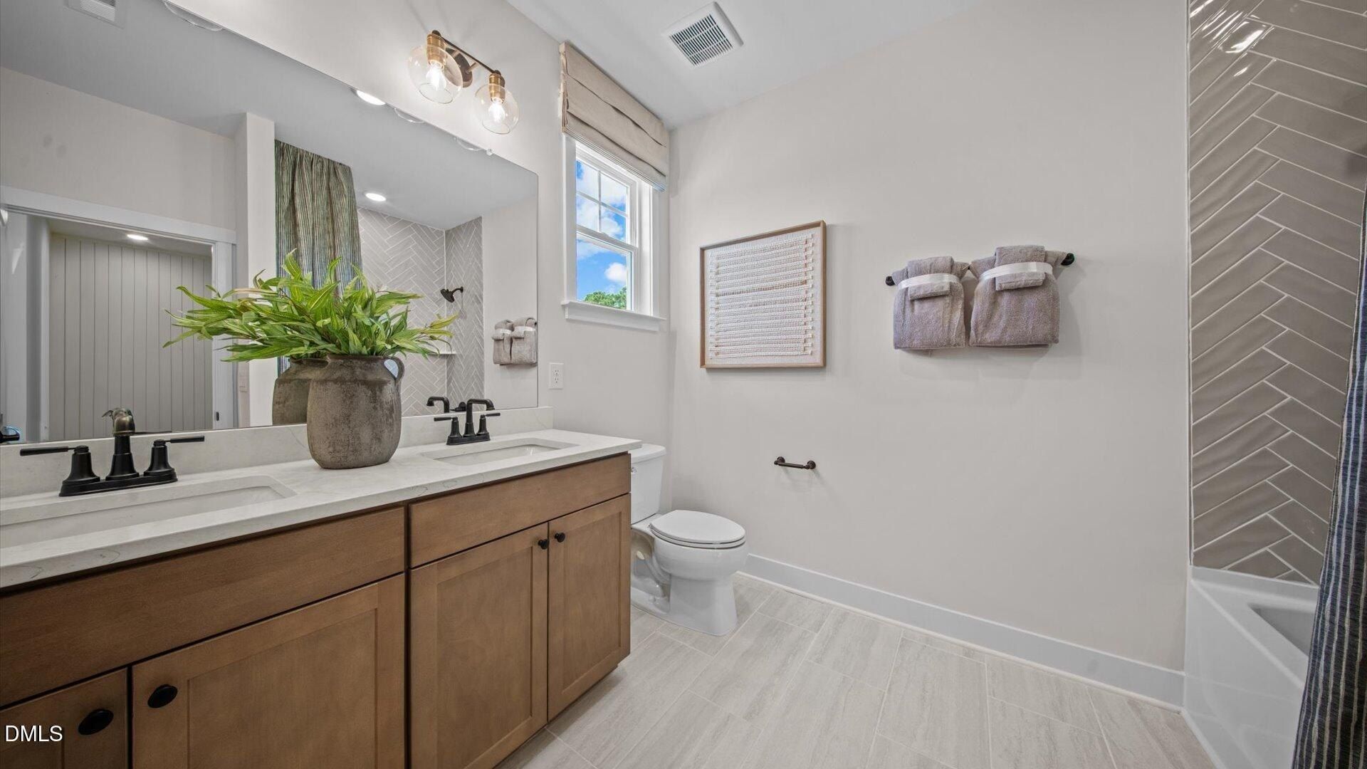 6042 Dunzo Drive. Raleigh, NC 27617